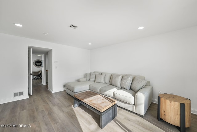 living room with hardwood / wood-style floors