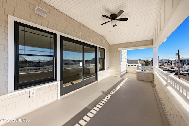 balcony featuring ceiling fan