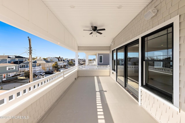 balcony featuring ceiling fan