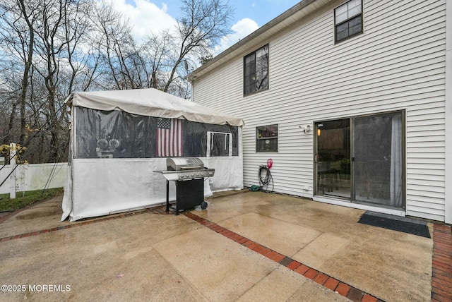 rear view of property featuring a patio