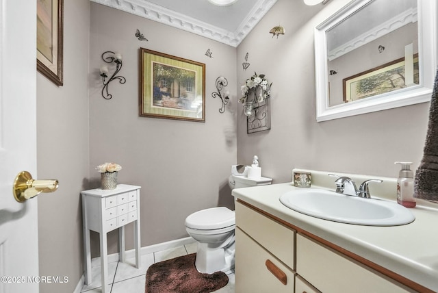 bathroom with vanity, tile patterned floors, and toilet