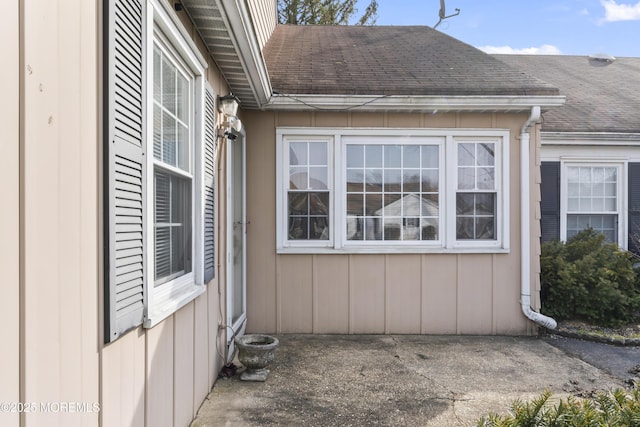 view of side of home with a patio area