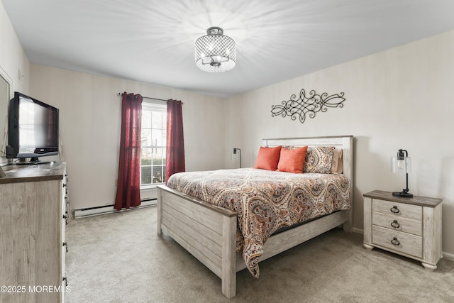 bedroom featuring a notable chandelier, light carpet, and a baseboard heating unit