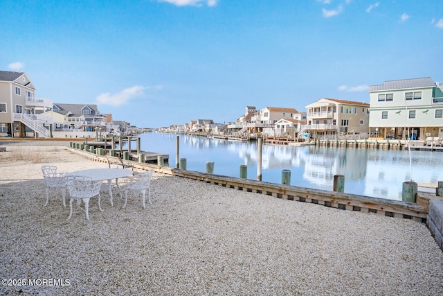 dock area featuring a water view