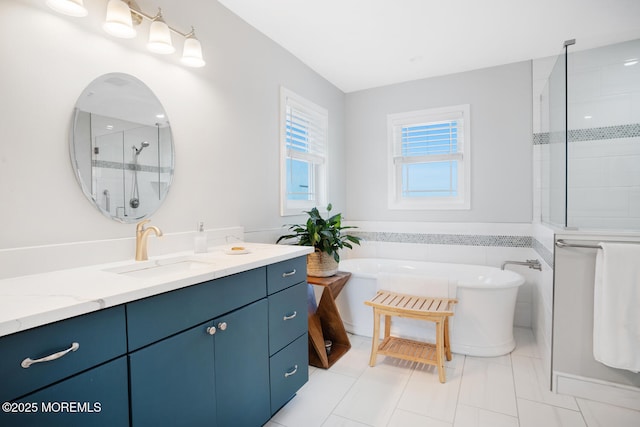 bathroom featuring plus walk in shower and vanity