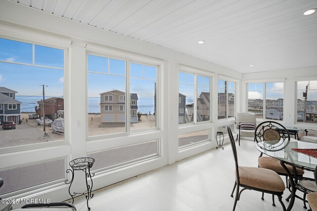 sunroom / solarium with a healthy amount of sunlight