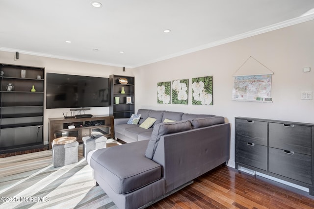 living room featuring crown molding and dark hardwood / wood-style flooring