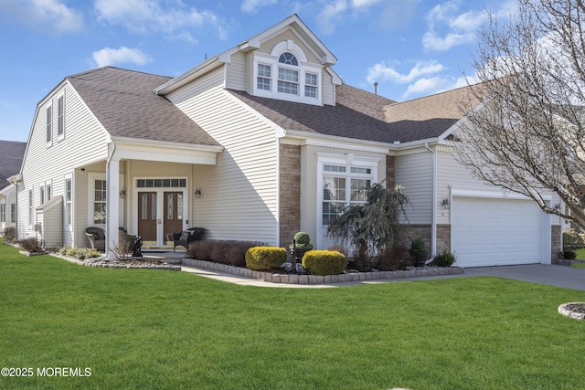 front of property featuring a garage and a front yard