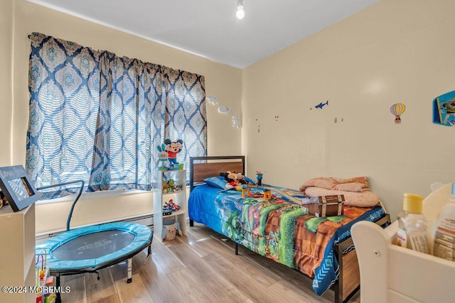 bedroom featuring light hardwood / wood-style floors