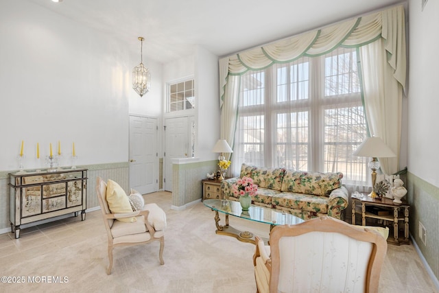 living area with a chandelier