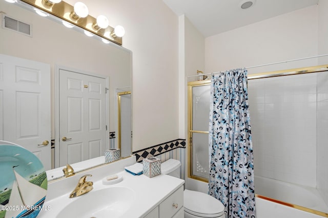 full bathroom featuring vanity, toilet, and shower / bath combo with shower curtain