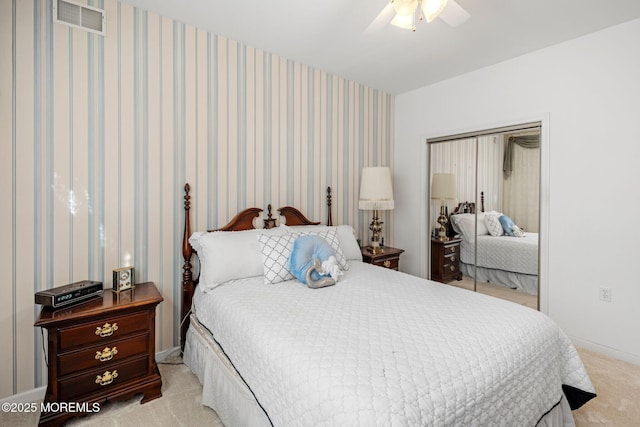 carpeted bedroom featuring ceiling fan