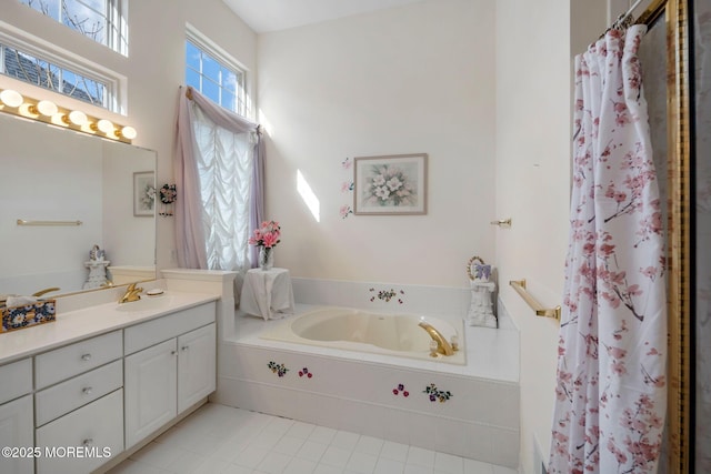 bathroom featuring tile patterned floors, vanity, and independent shower and bath