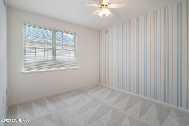 5 Shoal Dr, Barnegat, NJ 08005 - carpeted spare room with baseboards and a ceiling fan