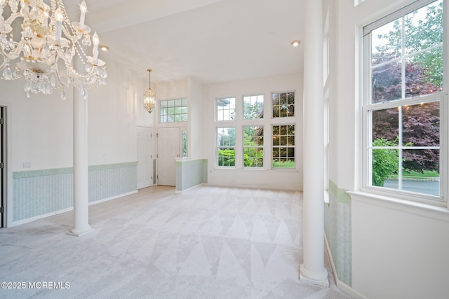 5 Shoal Dr, Barnegat, NJ 08005 - unfurnished living room featuring carpet, a chandelier, and recessed lighting