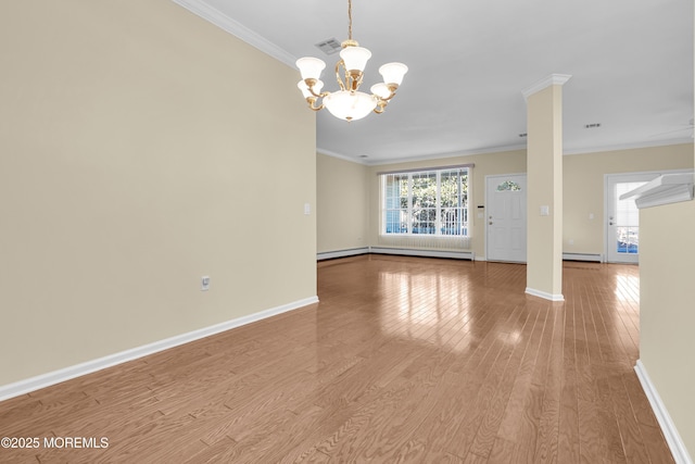 interior space with ornamental molding, light wood-type flooring, and a baseboard radiator