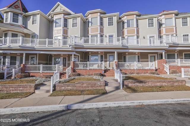 view of property featuring a porch