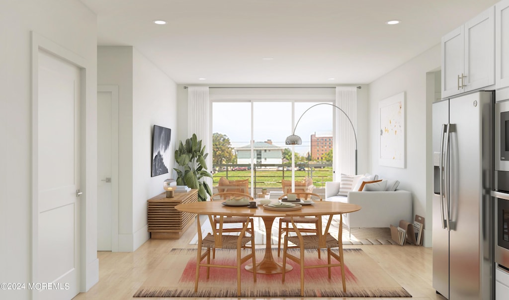 dining area with light hardwood / wood-style flooring