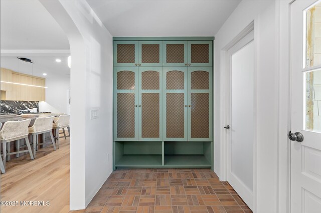 402 Fifth Ave, Asbury Park, NJ 07712 - hall featuring arched walkways, recessed lighting, and baseboards