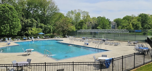90 Van Liew Ct, East Brunswick, NJ 08816 - community pool with a patio area and view of scattered trees