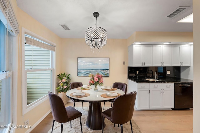 90 Van Liew Ct, East Brunswick, NJ 08816 - dining space with light wood-style flooring and a chandelier