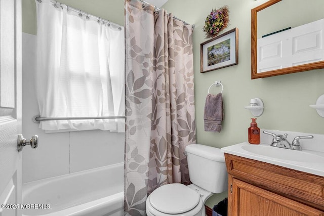 full bathroom with shower / bath combination with curtain, vanity, and toilet