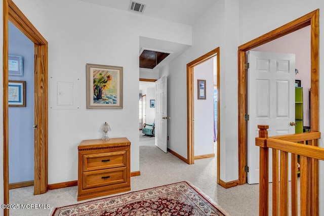 hallway with light carpet