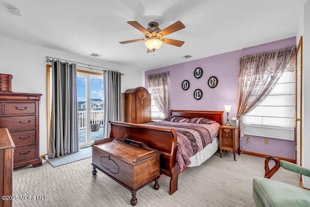 carpeted bedroom featuring access to outside and ceiling fan