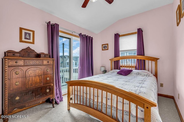 carpeted bedroom with vaulted ceiling, access to outside, and ceiling fan