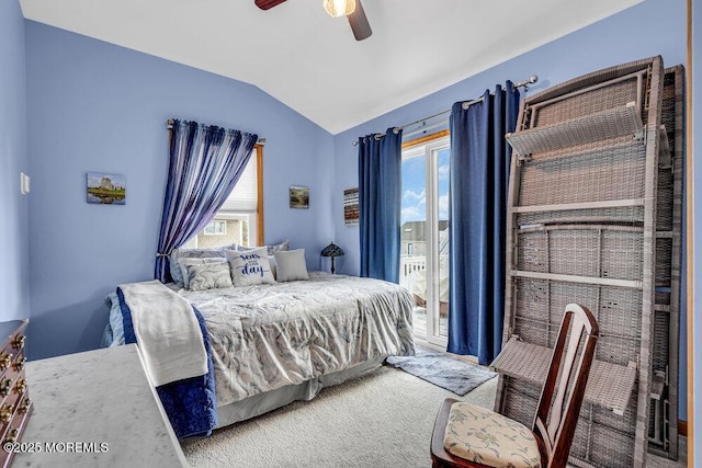 bedroom featuring vaulted ceiling, carpet flooring, access to outside, and ceiling fan