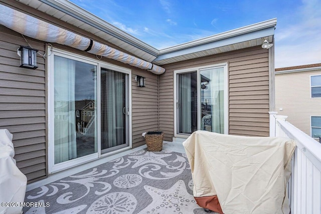 view of patio with a balcony