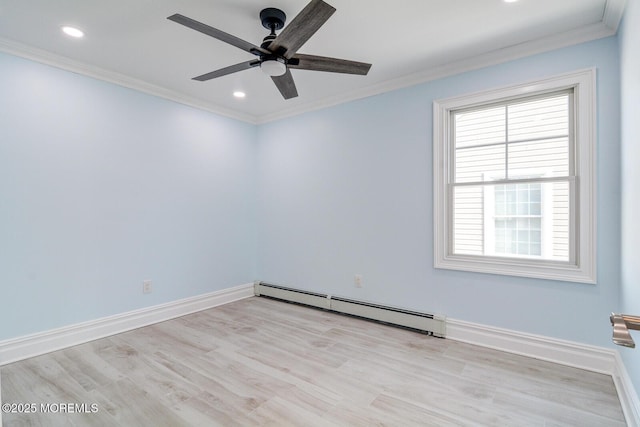 unfurnished room featuring a baseboard heating unit, light hardwood / wood-style flooring, ornamental molding, and ceiling fan