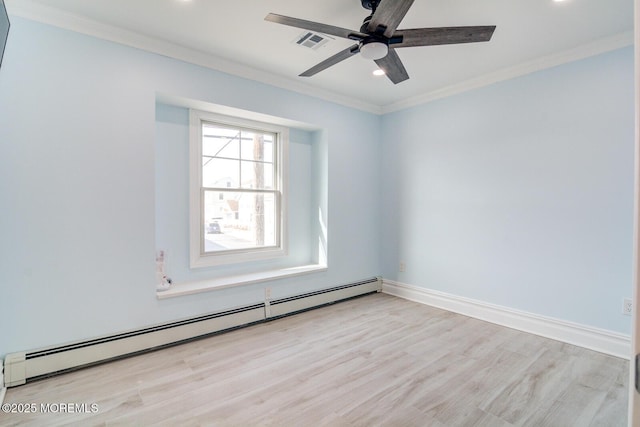 empty room with crown molding, a baseboard radiator, and light hardwood / wood-style flooring