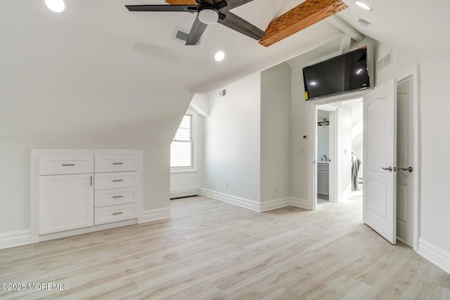 bonus room with a baseboard radiator, lofted ceiling, ceiling fan, and light wood-type flooring