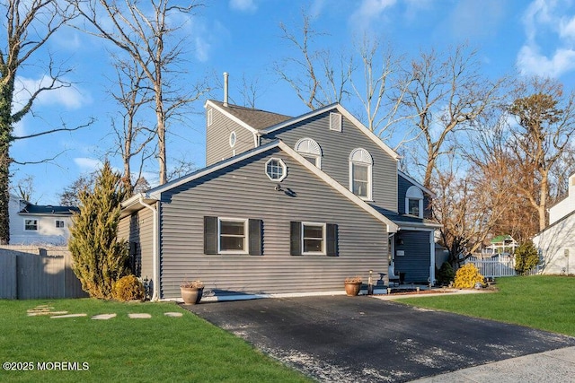 exterior space featuring a front yard