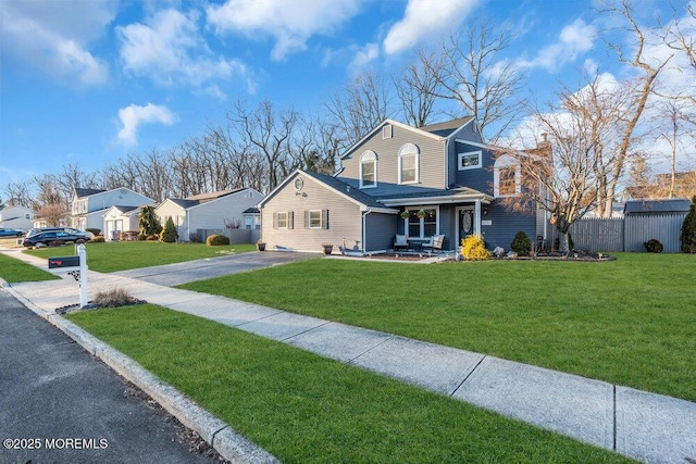 view of front property featuring a front yard