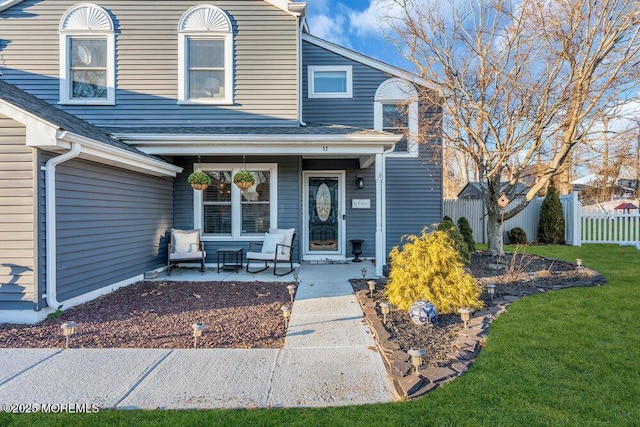 view of front property featuring a patio and a front lawn