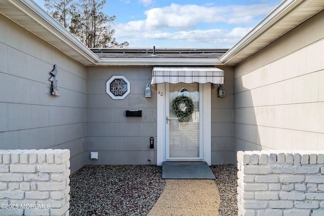 property entrance featuring a garage