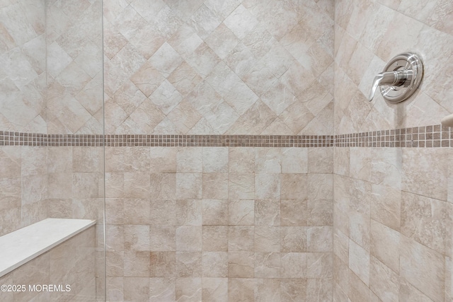 details featuring a tile shower