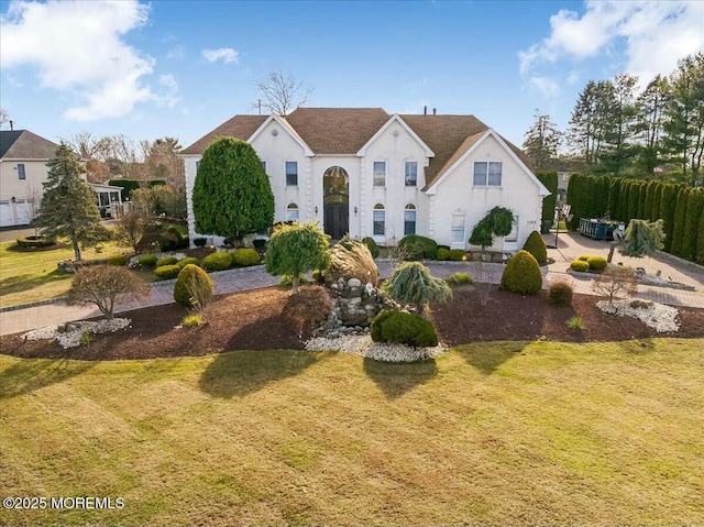 view of front of property with a front lawn