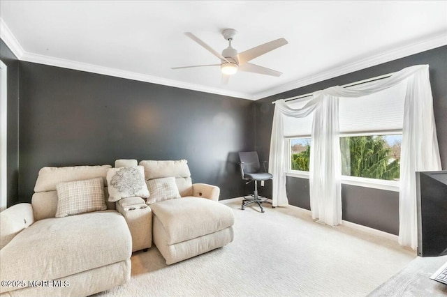 carpeted living room featuring ornamental molding and ceiling fan