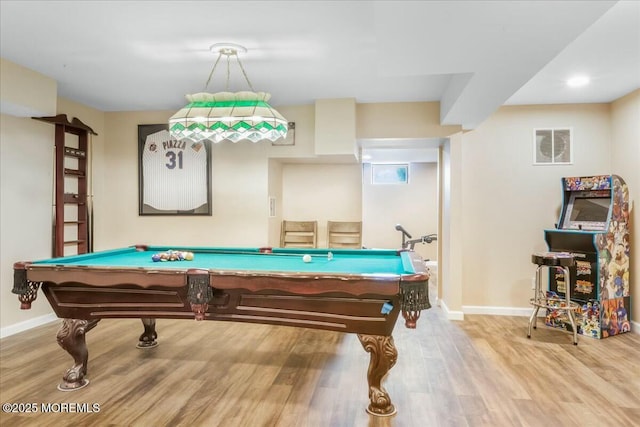 playroom with wood-type flooring and billiards