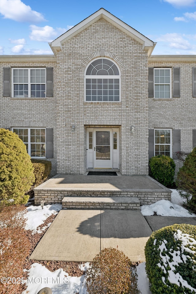 view of front facade with a patio area