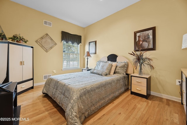 bedroom featuring light hardwood / wood-style flooring