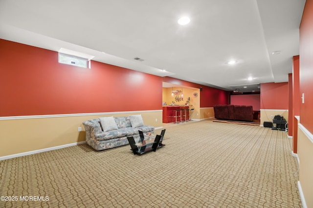 interior space with bar and carpet flooring