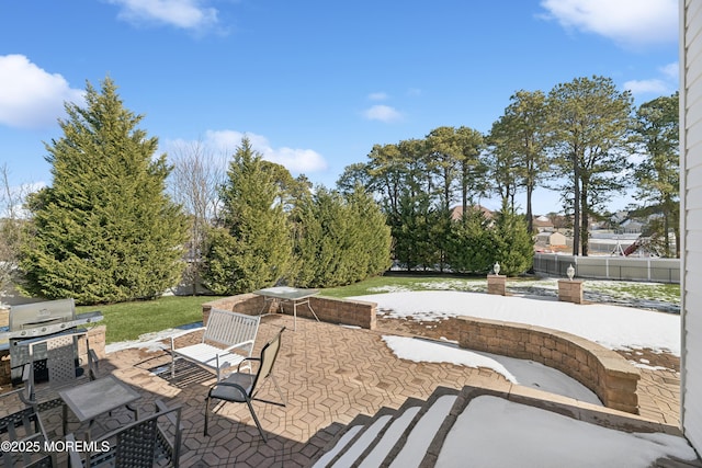 view of patio with a grill