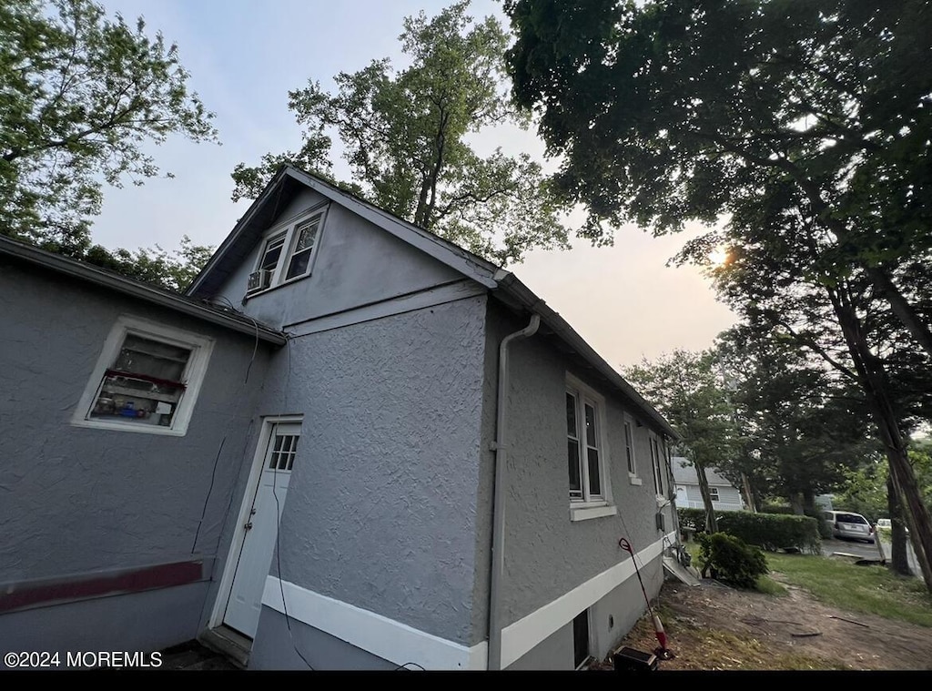 view of property exterior at dusk