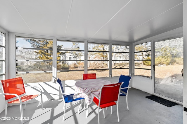 sunroom / solarium featuring a healthy amount of sunlight