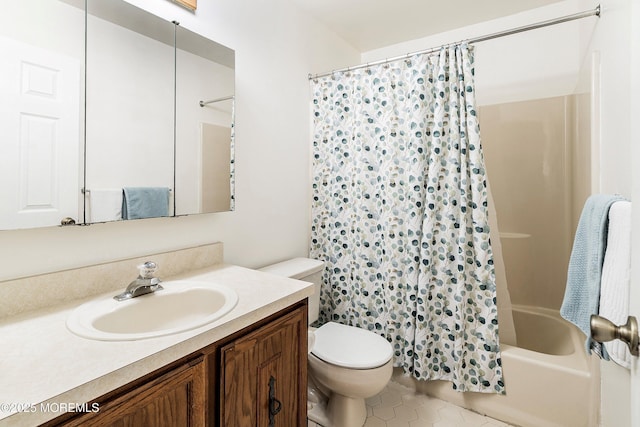 full bathroom with tile patterned flooring, vanity, shower / bath combo with shower curtain, and toilet