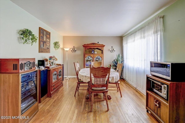 dining area with light wood-type flooring